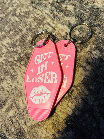 Get in losers hotel keychain